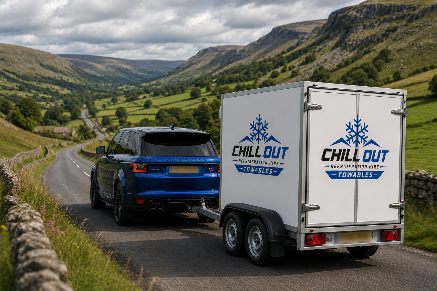 Chill Out refrigerated trailer being towed along a scenic UK road